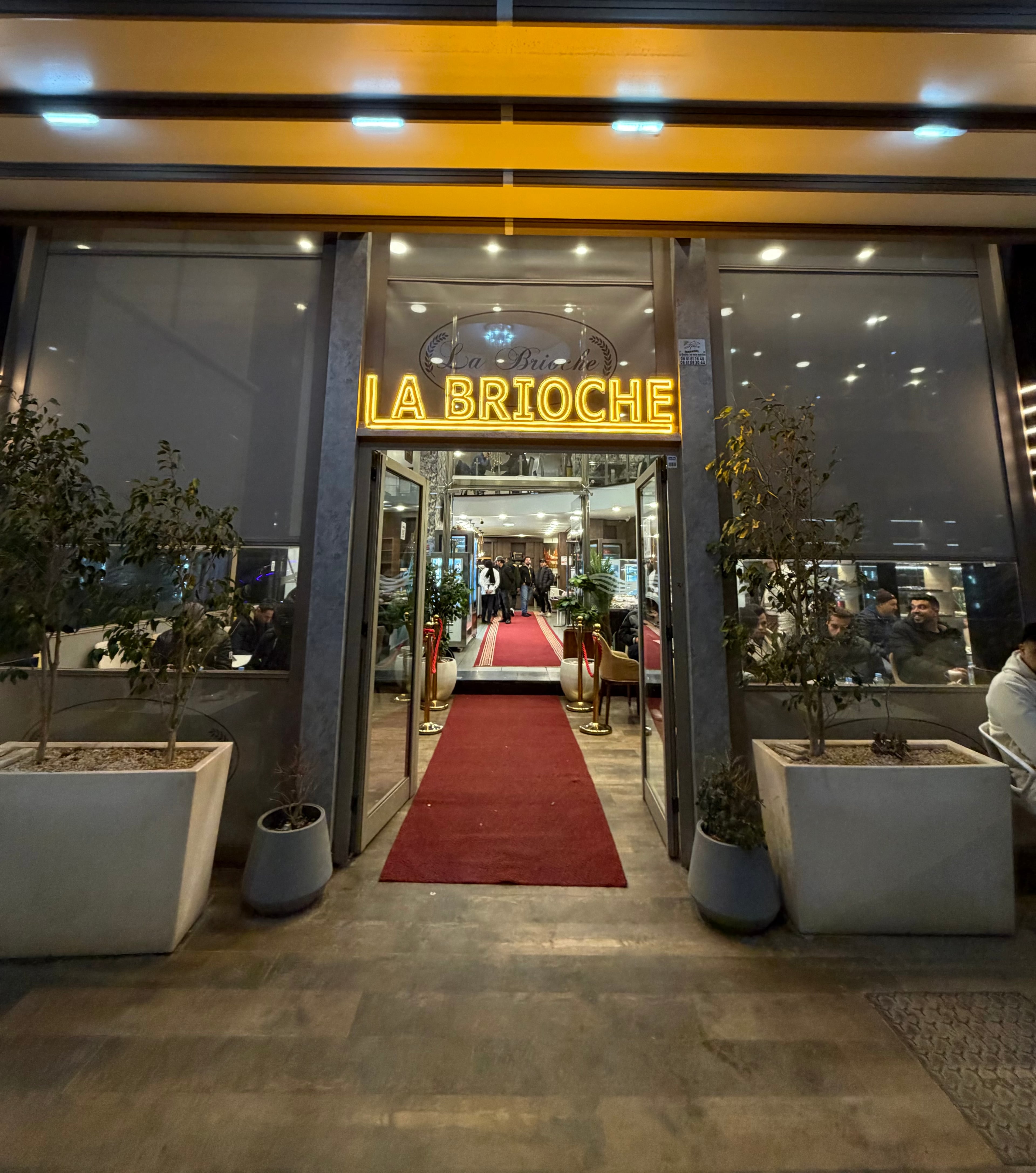 La Brioche Blanche - Fresh French pastries and bakery interior showcasing croissants, bread, and coffee